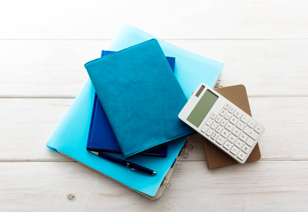 Office supply on office desk table. Top view with copy space.